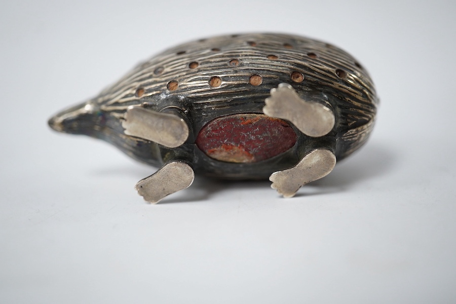 An Edwardian novelty silver pin cushion, modelled as a hedgehog, Adie & Lovekin Ltd, Birmingham, 1906, 52mm. Condition - fair to good